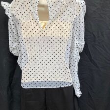 Black biketard with black and white spotty sheer over top and puff sleeves