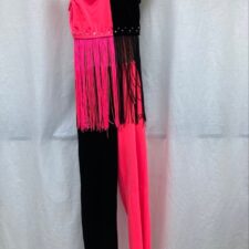 Neon pink and black velvet crop top with fringing and flared trousers