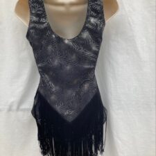 Black and silver leotard with fringe skirt, fringed gloves and headband