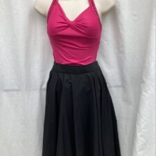 Pink halter neck leotard with black circle skirt