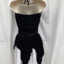 Black velvet leotard with silver diamond shaped pattern, handkerchief hem skirt and gloves