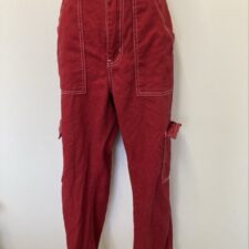 Red cargo trousers with white stitching