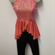 Neon metallic orange sequin bodice and black cropped catsuit with skirt