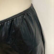 Black leather look trousers