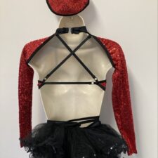 Red sequin and black leotard with ruffle bustle, separate sleeves and hat