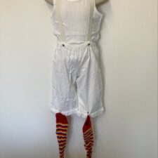 White tank top and trousers with braces and stripy socks