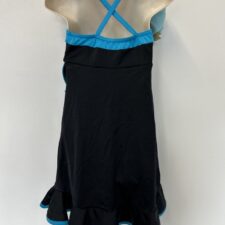 Black dress with side ruffle and large flower (undergarment needed)