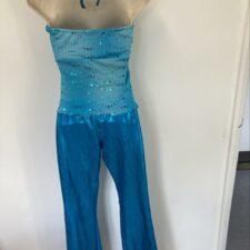 Turquoise metallic trousers and flowy halter  top
