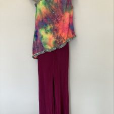 Raspberry trousers and tie dye one shoulder top