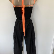 Black hip hop trousers, crop top and graffiti print halter top