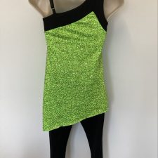 Neon green sequin A-line top and black cropped trousers