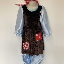 Brown patched velvet dress and pale blue satin pantaloons and headscarf