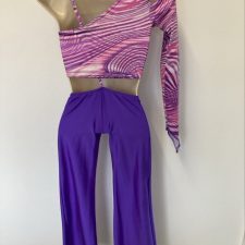 Pink and purple swirl single arm print top and purple trousers all-in-one