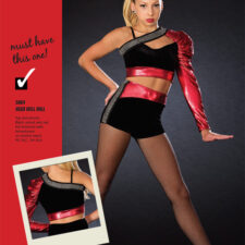 Black velvet bike shorts and red satin single sleeve crop top with sparkle trim