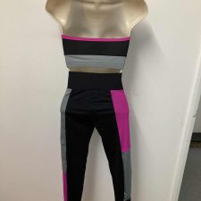 Black leggings and crop top with pink and grey block design