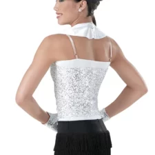 Black, white and silver vest, leotard, fringe skirt, tie, wrist bands and hat
