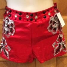 Red metallic shorts with black and silver sequin flowers