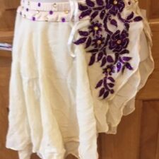 Cream angled skirt with purple floral appilque
