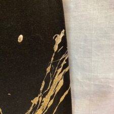 Black trousers with gold metallic splatter paint