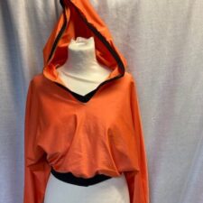 Orange hooded top with black trim