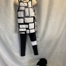 Black and white catsuit with geometric over top and knit cap