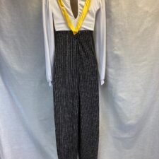 All in one with sparkle pinstripe trousers, white shirt, yellow braces and tie
