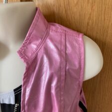 Black and white checkerboard leotard, metallic pink vest and matching trousers