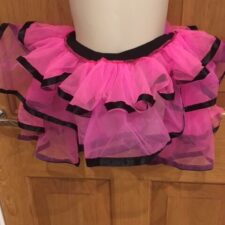 Pink ruffle skirt with black ribbon edging