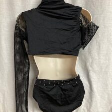Black and gold crop top, briefs and shrug with fishnet and chains