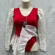 Red leotard with white lace sleeves and skirt