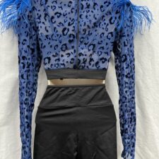 Royal blue and black animal print over top with feathers, black crop top and bike shorts