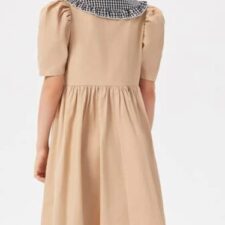Tan peasant dress with black and white check collar
