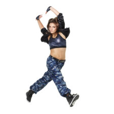 Blue camo trousers, jacket, sequin bra top and gloves