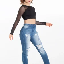 Stone washed jeans with ripped patches