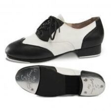 Black and white wing tip style tap shoes