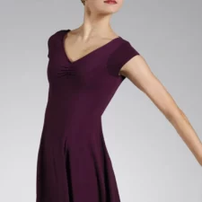 Plum skirted leotard with cap sleeves and rouched front