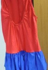 Red playsuit with blue skirt