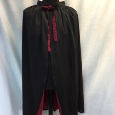 Black cape with burgundy lining