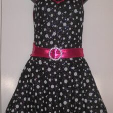 Black, white and pink spotty skirted leotard, belt and hair bow