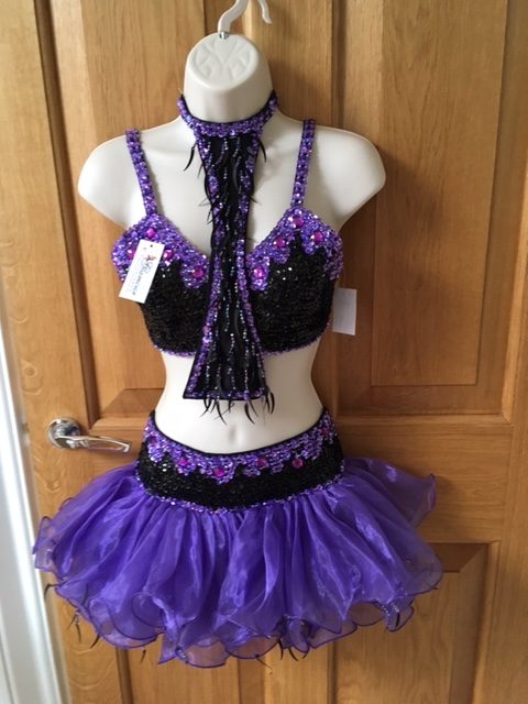 Purple and black sequin crop top with ruffle skirt